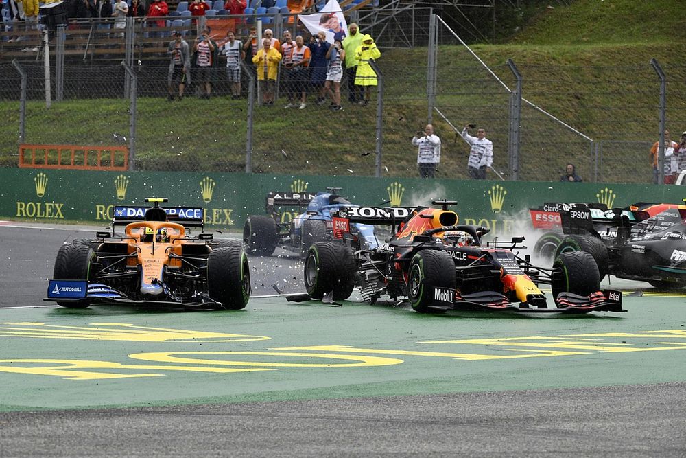 Lando Norris, McLaren MCL35M, Max Verstappen, Red Bull Racing RB16B, and Valtteri Bottas, Mercedes W12, collide at the start