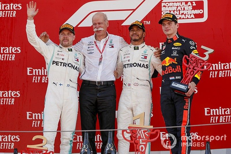 Valtteri Bottas, Mercedes AMG F1, Dr Dieter Zetsche, CEO, Mercedes Benz, Race Winner Lewis Hamilton, Mercedes AMG F1, Max Verstappen, Red Bull Racing celebrate on the podium with the trophy 