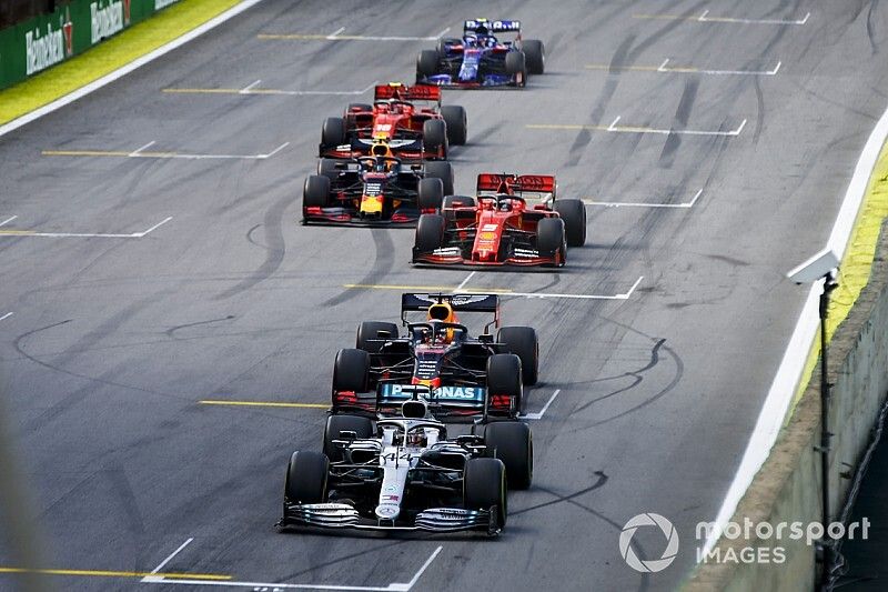 Lewis Hamilton, Mercedes AMG F1 W10 leads Max Verstappen, Red Bull Racing RB15, Sebastian Vettel, Ferrari SF90 and Alexander Albon, Red Bull RB15 at the restart 