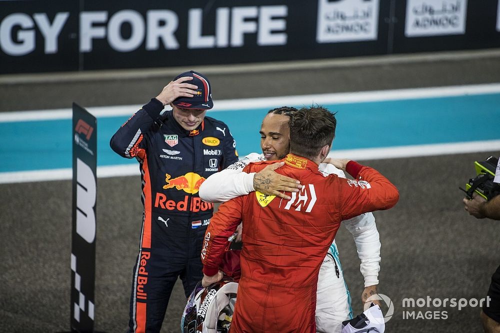 Charles Leclerc, Ferrari, 3rd position, congratulates Lewis Hamilton, Mercedes AMG F1, 1st position, after the race