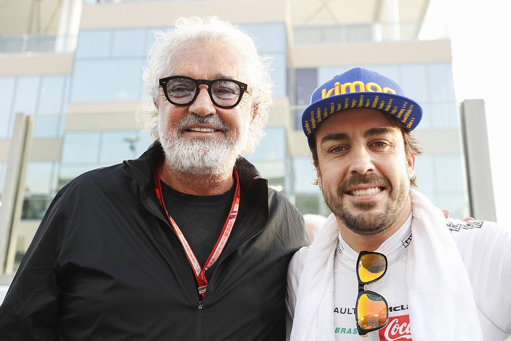 Fernando Alonso, McLaren, with Flavio Briatore on the grid