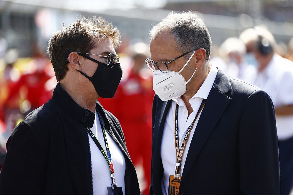 Tom Cruise and Stefano Domenicali, CEO, Formula 1, on the grid