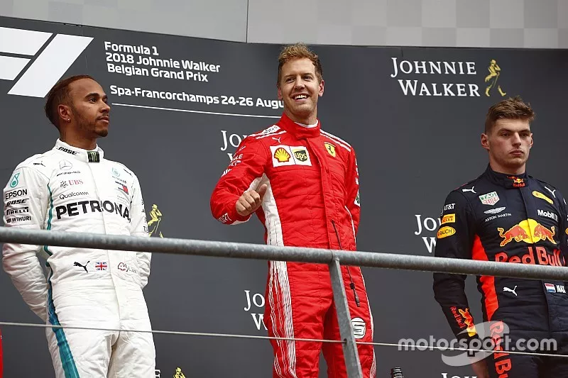 Le vainqueur Sebastian Vettel, Ferrari, le deuxi&egrave;me, Lewis Hamilton, Mercedes AMG F1, le troisi&egrave;mee, Max Verstappen, Red Bull Racing