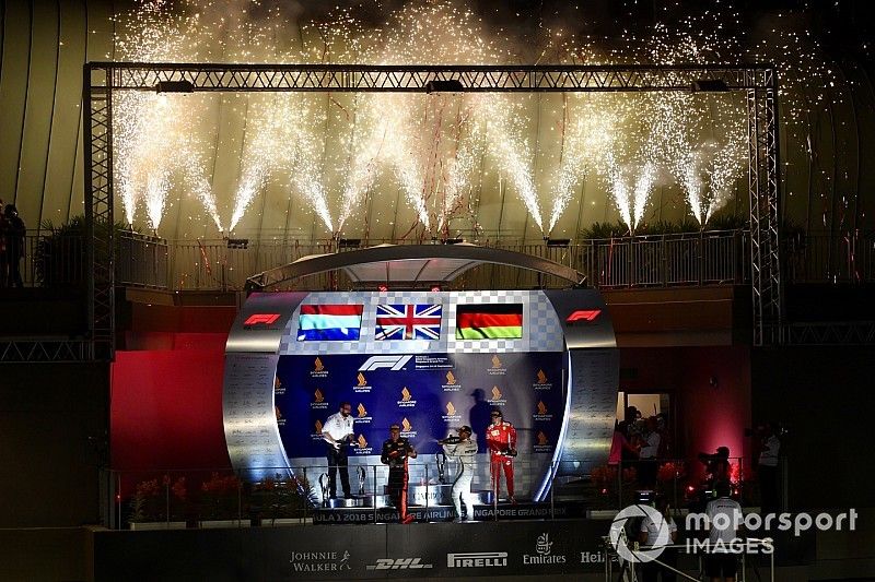 (L to R): Max Verstappen, Red Bull Racing, Lewis Hamilton, Mercedes AMG F1 and Sebastian Vettel, Ferrari celebrate on the podium with the champagne 