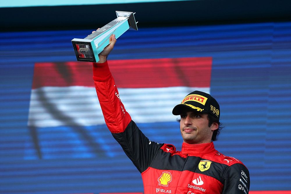 Carlos Sainz, Ferrari, 3rd position, celebrates on the podium with his trophy