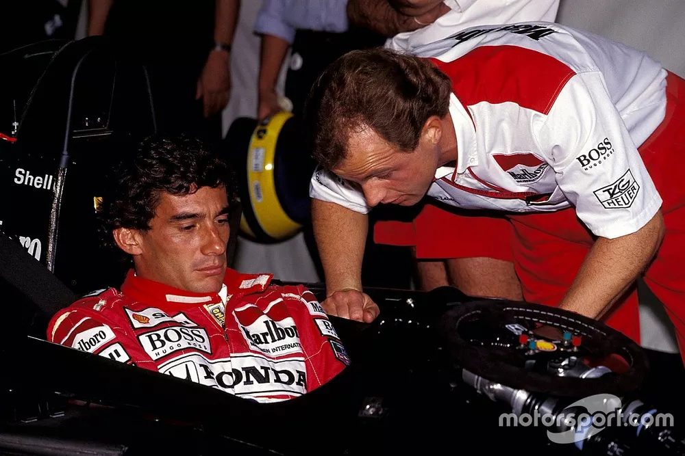 Ayrton Senna, McLaren confers with Josef Leberer, McLaren Physio