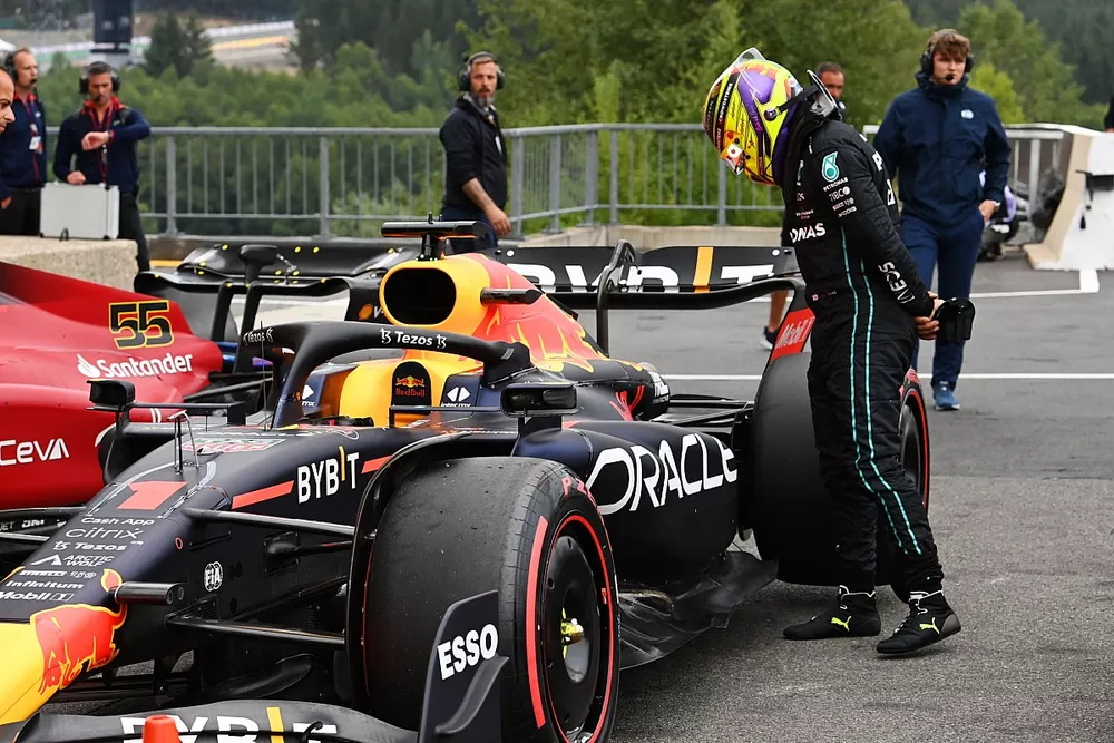 Lewis Hamilton, Mercedes-AMG, inspects the car of Max Verstappen, Red Bull Racing RB18, in Parc Ferme after Qualifying