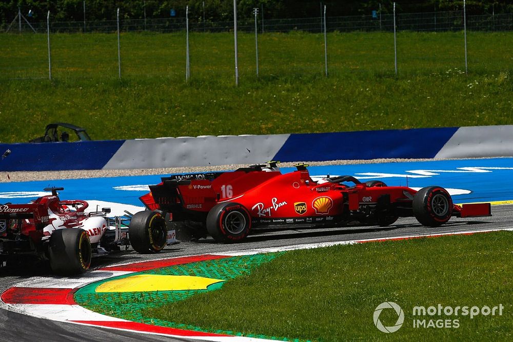 Charles Leclerc, Ferrari SF1000, and Sebastian Vettel, Ferrari SF1000 collide on the opening lap