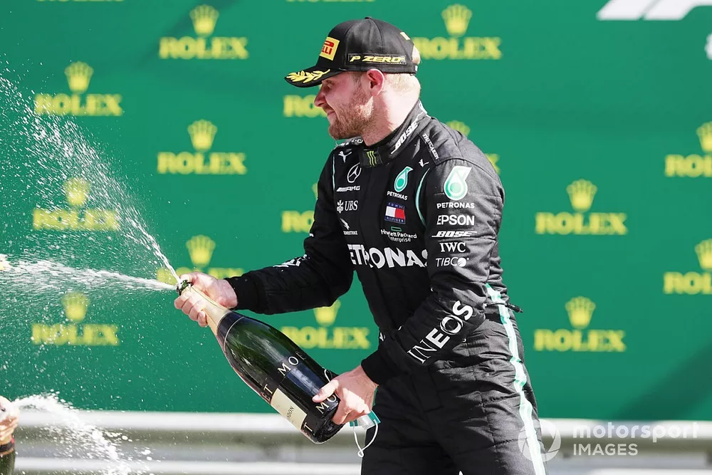 Valtteri Bottas, Mercedes-AMG Petronas F1, celebrates with champagne on the podium