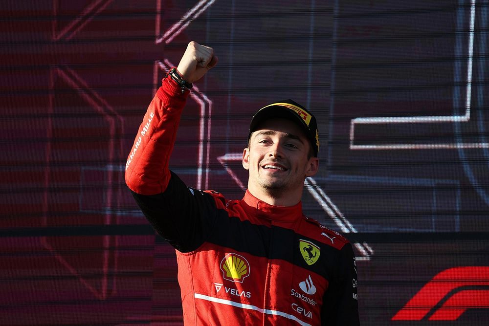 Charles Leclerc, Ferrari, 1st position, celebrates on the podium
