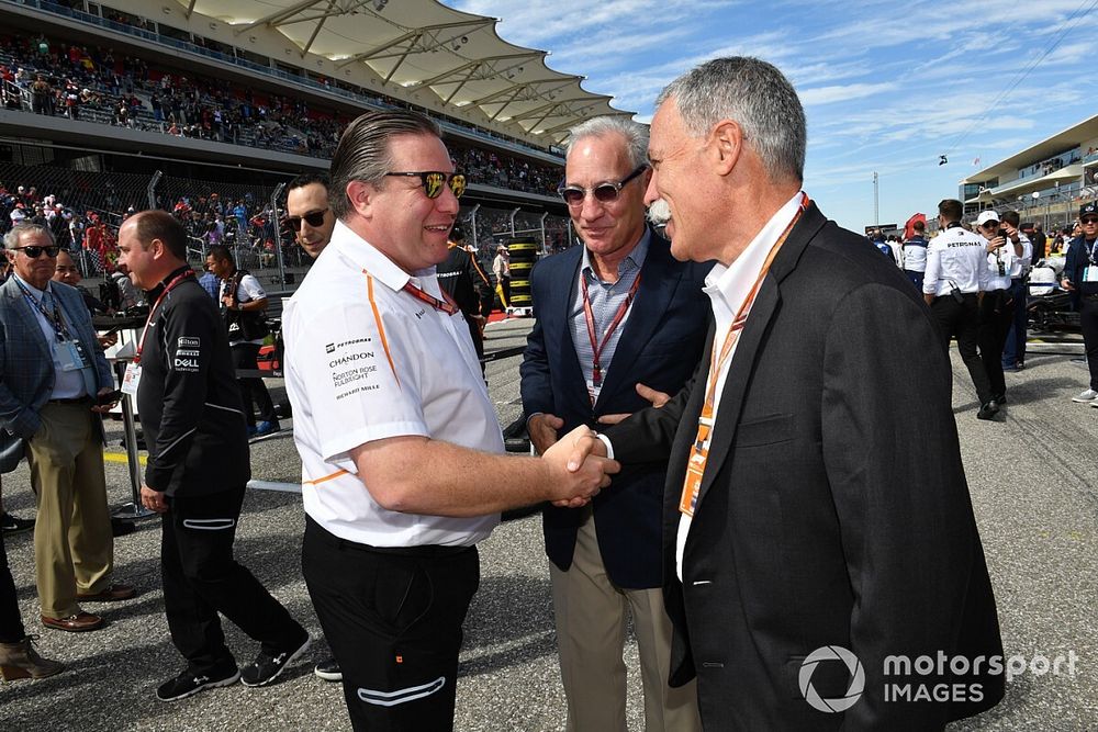 Zak Brown, McLaren Racing CEO and Chase Carey, Chief Executive Officer and Executive Chairman of the Formula One Group on the grid 