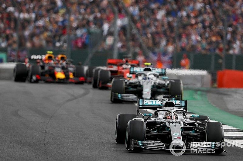 Lewis Hamilton, Mercedes AMG F1 W10, leads Valtteri Bottas, Mercedes AMG W10, Sebastian Vettel, Ferrari SF90, and Pierre Gasly, Red Bull Racing RB15