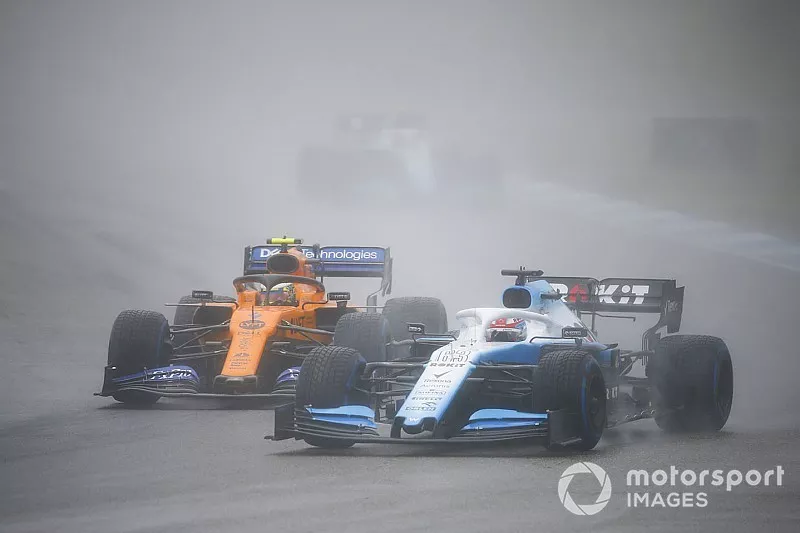 George Russell, Williams Racing FW42, leads Lando Norris, McLaren MCL34