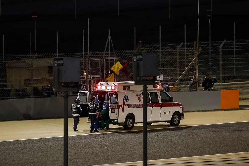 The crashed car of Romain Grosjean, Haas VF-20 on fire