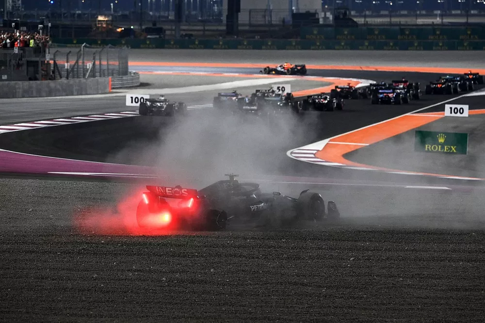 Max Verstappen, Red Bull Racing RB19, the field as Lewis Hamilton, Mercedes F1 W14, ends up in the gravel on the opening lap after contact with George Russell, Mercedes F1 W14