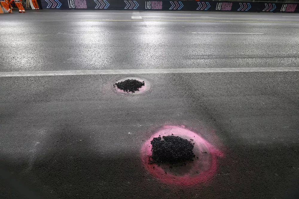 Manhole under repair on the circuit