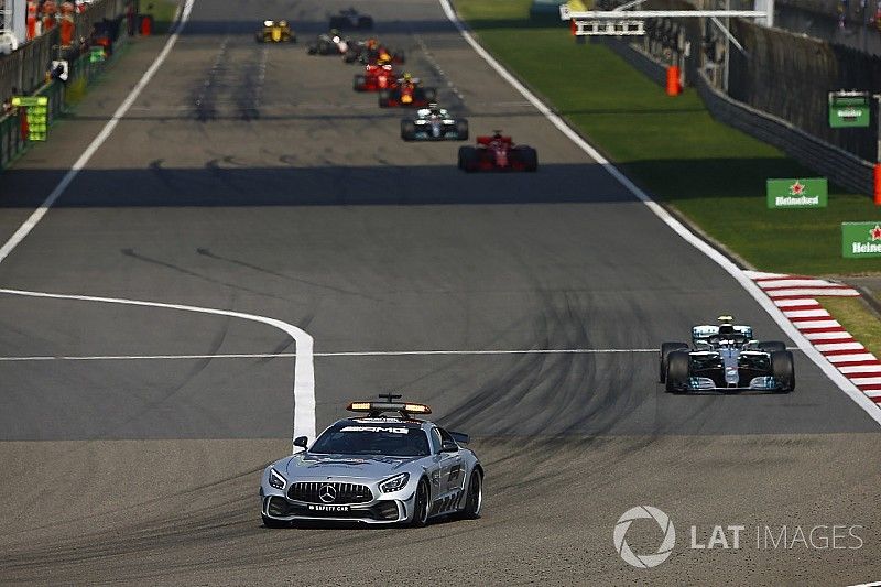 The AMG Mercedes safety-car leads Valtteri Bottas, Mercedes AMG F1 W09, Sebastian Vettel, Ferrari SF71H, Lewis Hamilton, Mercedes AMG F1 W09, and Max Verstappen, Red Bull Racing RB14 Tag Heuer