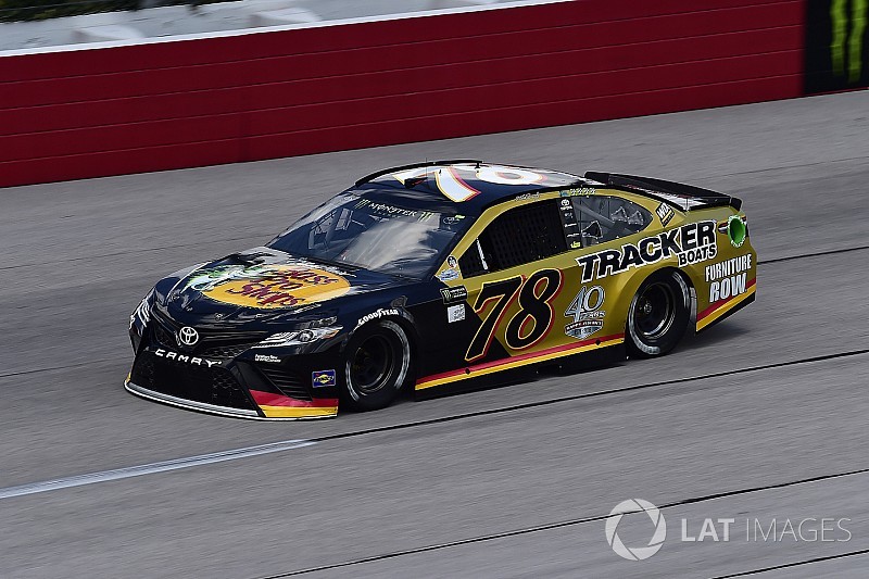 Truex wins Stage 1 at Darlington with last corner move on Larson
