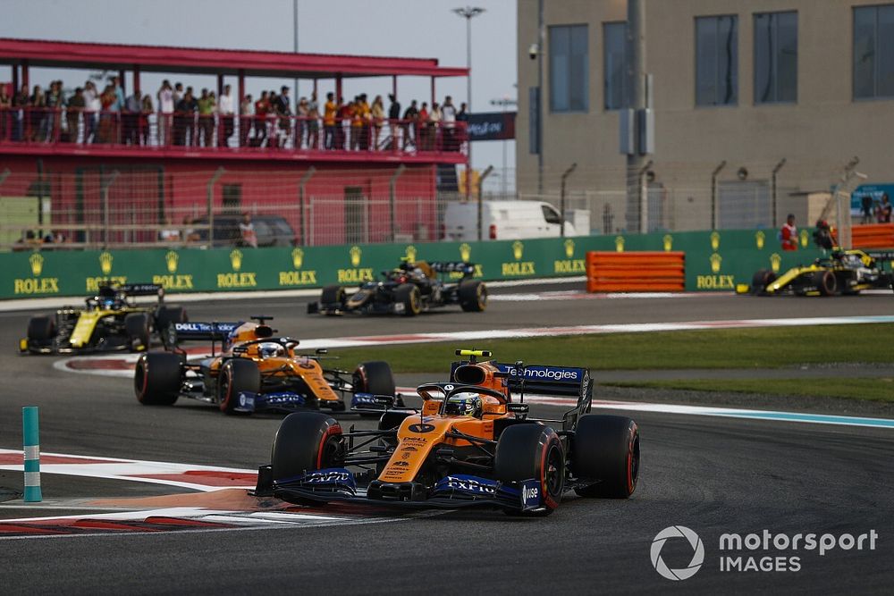 Lando Norris, McLaren MCL34, leads Carlos Sainz Jr., McLaren MCL34 and Daniel Ricciardo, Renault F1 Team R.S.19 