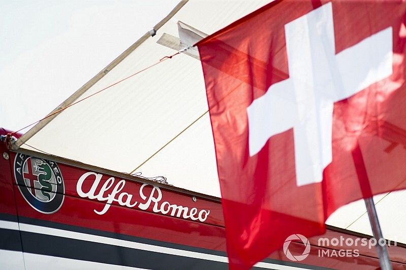 Alfa Romeo Racing hospitality with Swiss flags to celebrate National Swiss Day