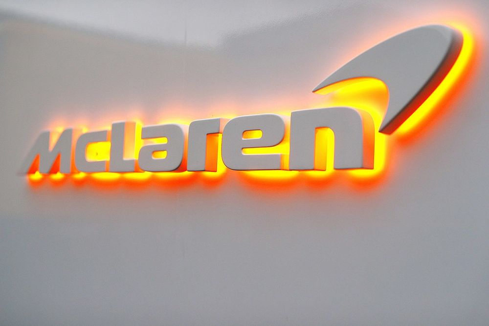 McLaren logo with orange lights