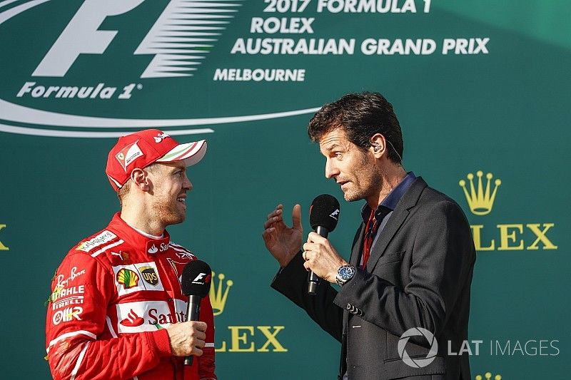 Sebastian Vettel, Ferrari, 1st Position, is interviewed by Mark Webber on the podium