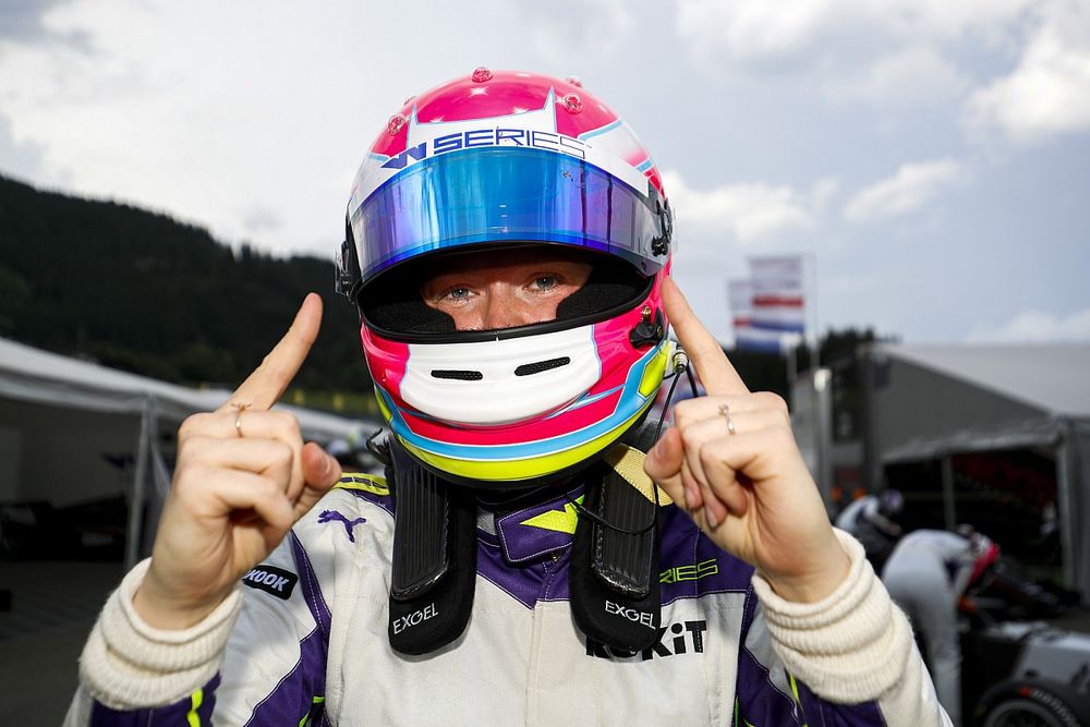 Alice Powell celebrates pole postion in Parc Ferme