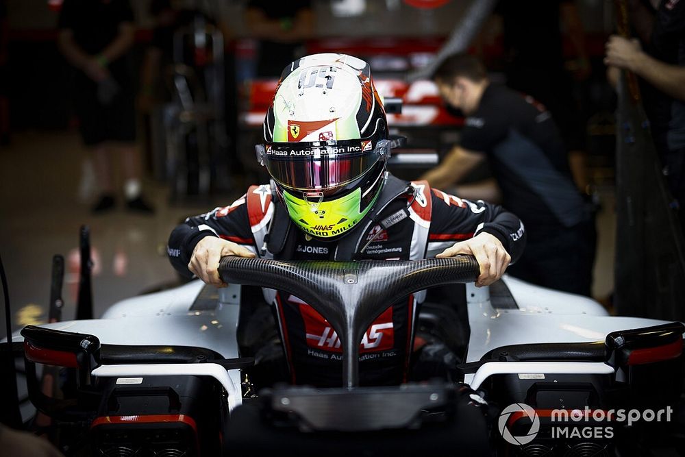 Mick Schumacher, Haas VF-20, gets into the car 