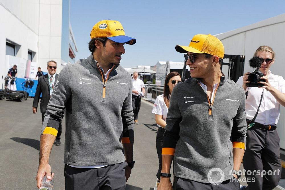 Carlos Sainz Jr., McLaren and Lando Norris, McLaren in the paddock 