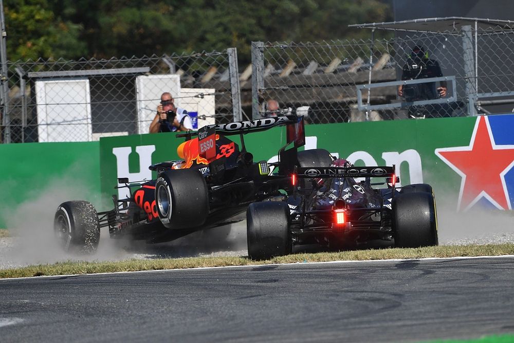 Max Verstappen, Red Bull Racing RB16B, and Lewis Hamilton, Mercedes W12, collide