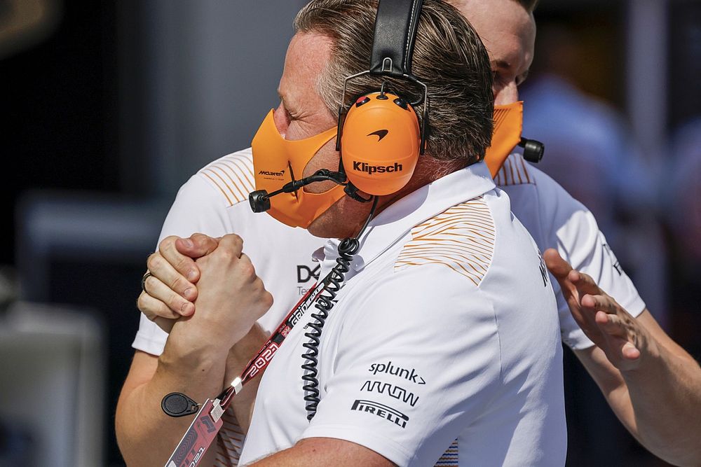 Zak Brown, CEO, McLaren Racing, celebrates with team mates after Qualifying