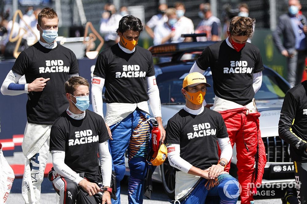 Daniil Kvyat, AlphaTauri, Romain Grosjean, Haas F1, Carlos Sainz Jr., McLaren, Lando Norris, McLaren, Charles Leclerc, Ferrari, Esteban Ocon, Renault F1, Nicholas Latifi, Williams Racing, and George Russell, Williams Racing, on the grid prior to the start in support of the End Racism campaign