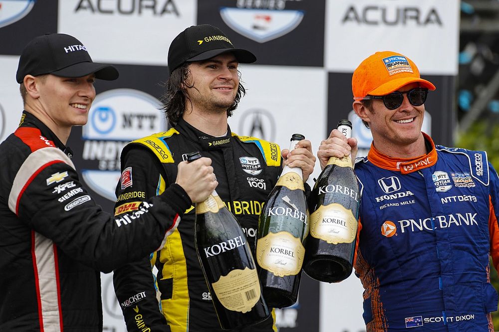 Colton Herta, Andretti Autosport w/ Curb-Agajanian Honda, Josef Newgarden, Team Penske Chevrolet, Scott Dixon, Chip Ganassi Racing Honda celebrate with champagne on the podium