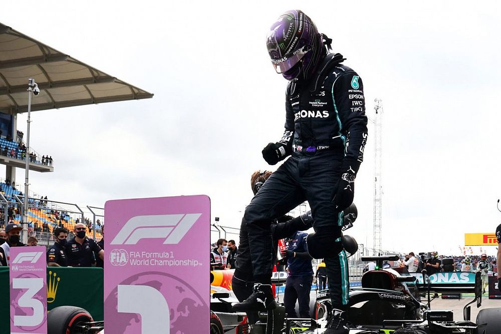 Lewis Hamilton, Mercedes, celebrates pole on arrival in Parc Ferme