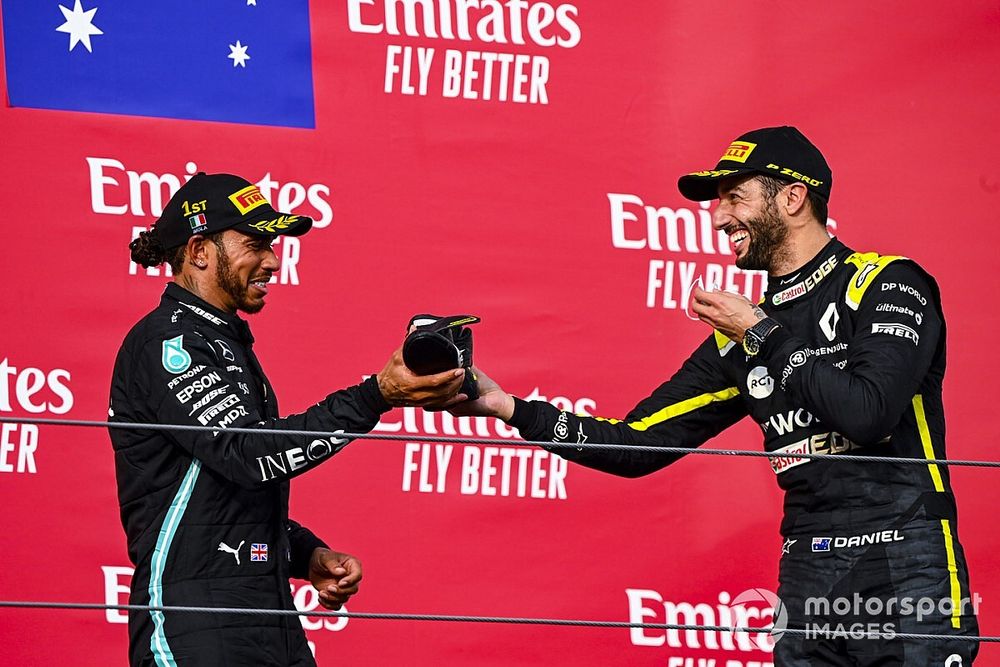 Race Winner Lewis Hamilton, Mercedes-AMG F1 and Daniel Ricciardo, Renault F1 celebrate on the podium with a shoey