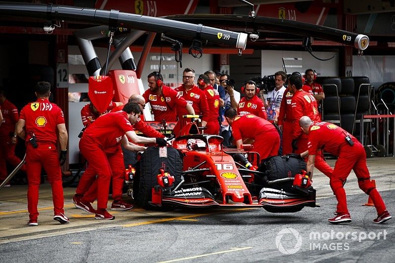 Charles Leclerc, Ferrari SF90, is returned to the garage