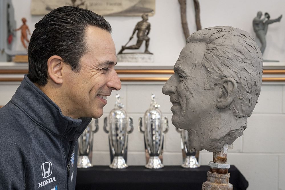 Castroneves models for his fourth Borg-Warner effigy