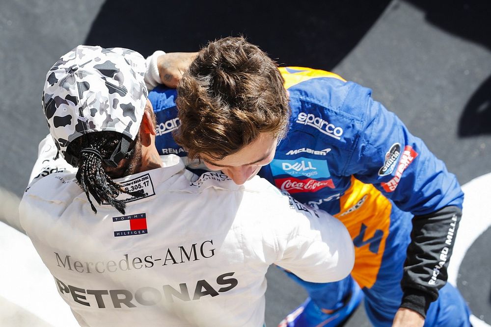 Lewis Hamilton, Mercedes AMG F1, celebrates winning his sixth world championship in parc ferme, and is congratulated by Lando Norris, McLaren 