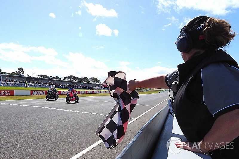 Marco Melandri, Aruba.it Racing-Ducati SBK Team takes chequered flag from Jonathan Rea, Kawasaki Racing Courtesy of WorldSBK