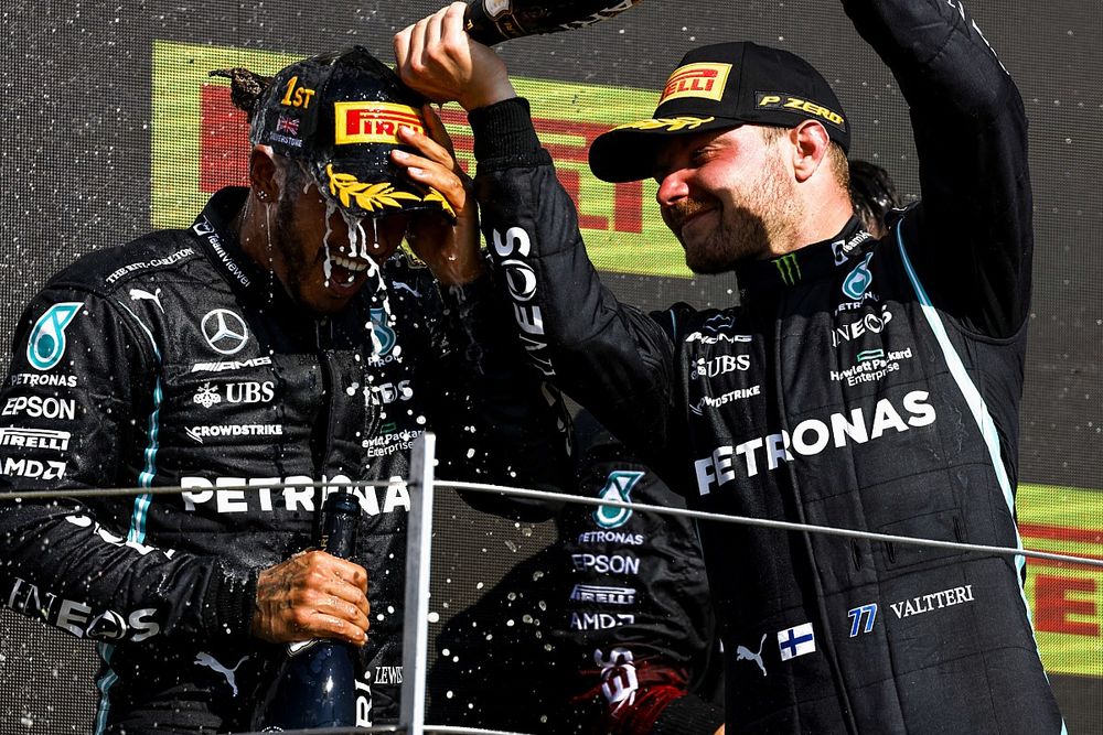 Valtteri Bottas, Mercedes, 3rd position, pours Champagne over Lewis Hamilton, Mercedes, 1st position, on the podium