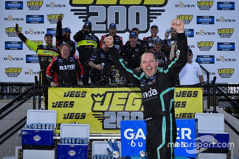 Johnny Sauter holds off Moffitt for third straight Dover Truck win