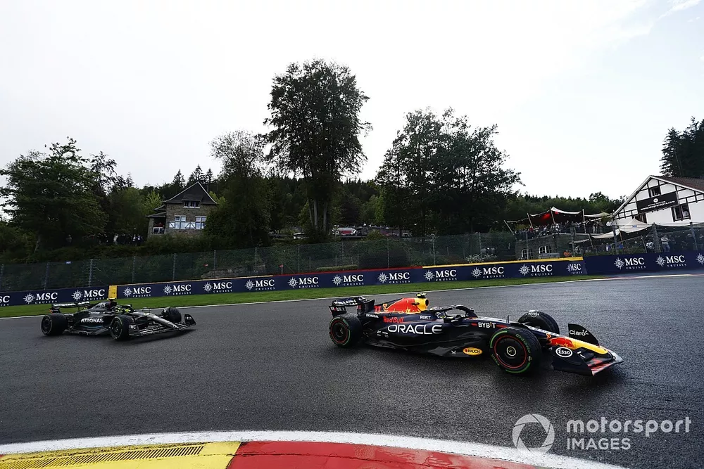 Sergio Perez, Red Bull Racing RB19, leads Sir Lewis Hamilton, Mercedes F1 W14