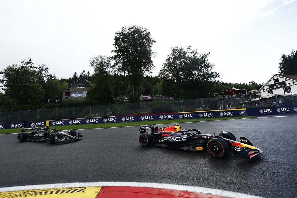 Sergio Perez, Red Bull Racing RB19, leads Sir Lewis Hamilton, Mercedes F1 W14