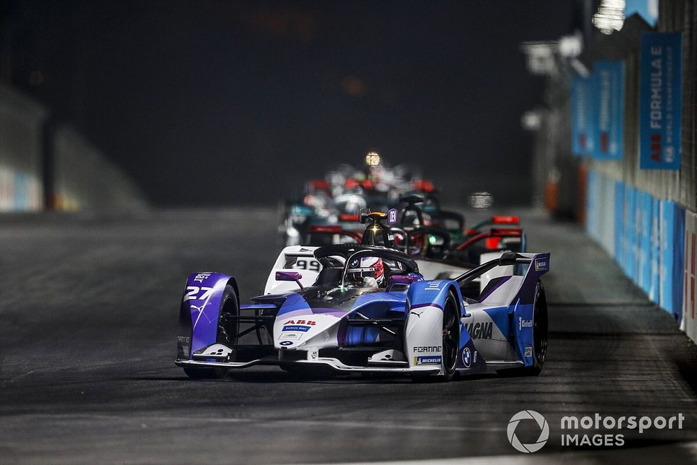 Jake Dennis, BMW I Andretti Motorsport, BMW iFE.21, leads Pascal Wehrlein, Tag Heuer Porsche, Porsche 99X Electric