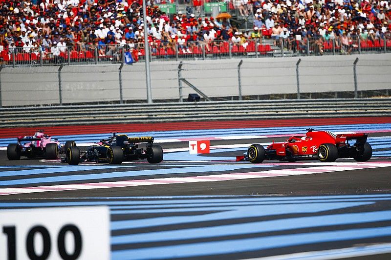 Sergio Perez, Force India VJM11, leads Nico Hulkenberg, Renault Sport F1 Team R.S. 18, and Sebastian Vettel, Ferrari SF71H