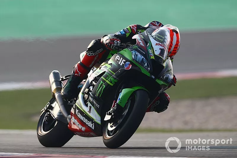 Jonathan Rea, Kawasaki Racing Team looking down at his bike