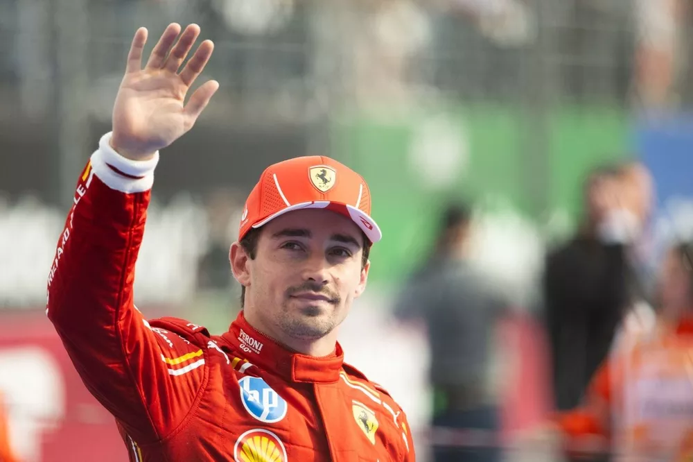 Charles Leclerc, Scuderia Ferrari, 3rd position, waves at the crowds