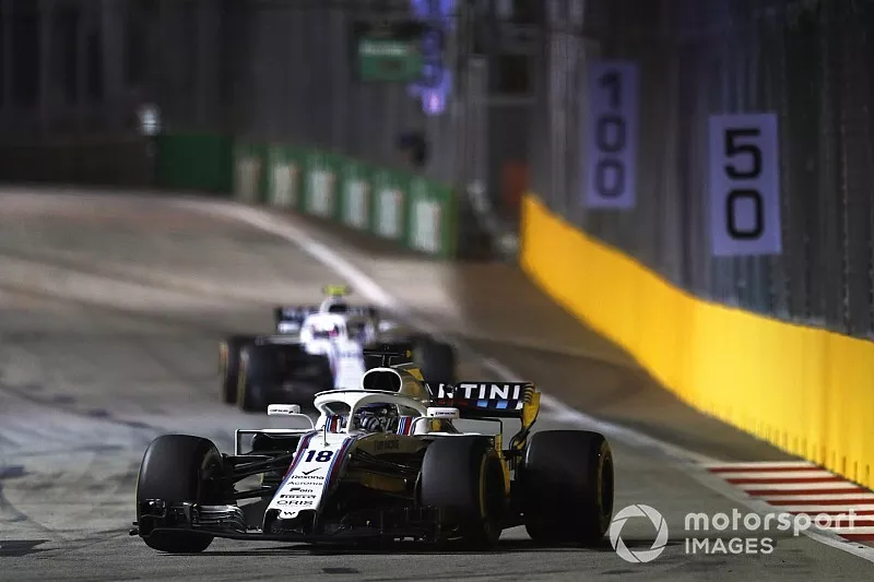 Lance Stroll, Williams FW41, leads Sergey Sirotkin, Williams FW41