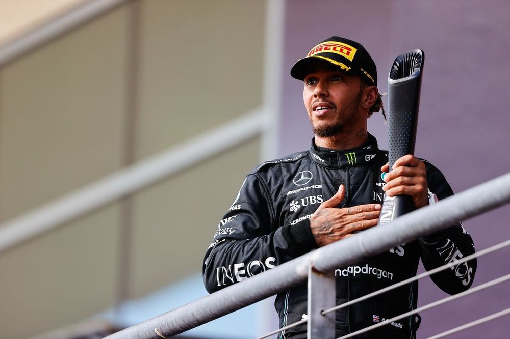 Lewis Hamilton, Mercedes-AMG, 2nd position, on the podium with his trophy