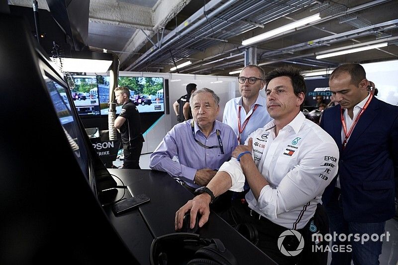 Jean Todt, President, FIA, joins Toto Wolff, Executive Director (Business), Mercedes AMG, in the Mercedes garage for Qualifying